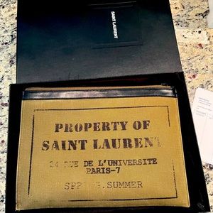 Yves St Laurent Khaki clutch bag gently used with dust bag, box and receipt saks
